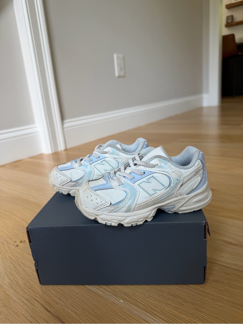 New Balance Kids White and Light Blue Sneakers